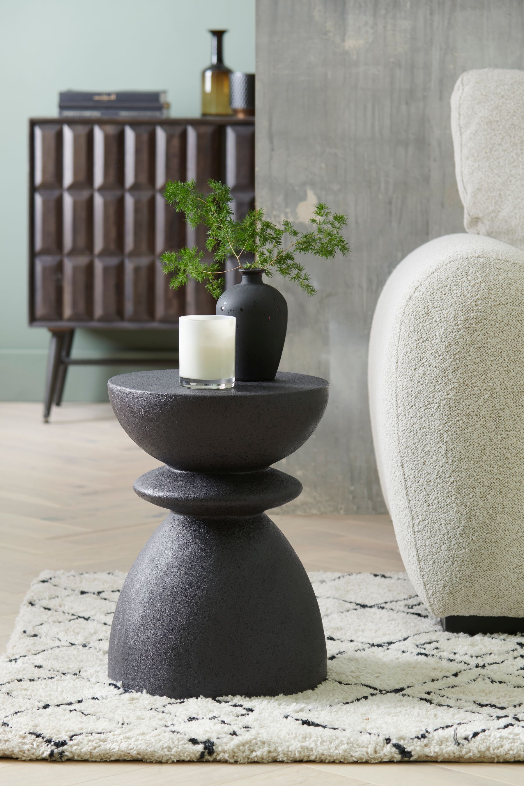 Black hourglass side table discount
