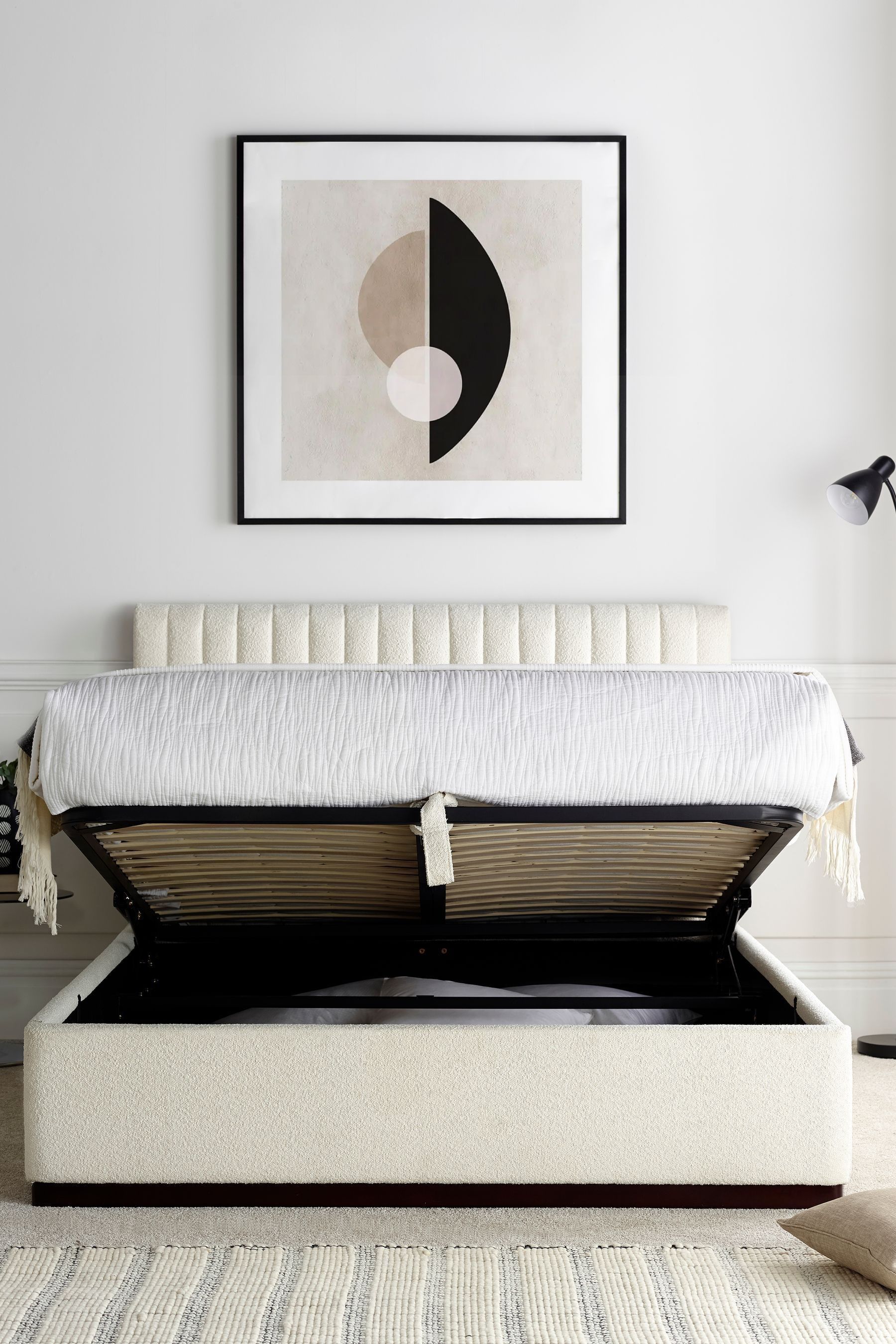 Anna upholstered store bed with drawers