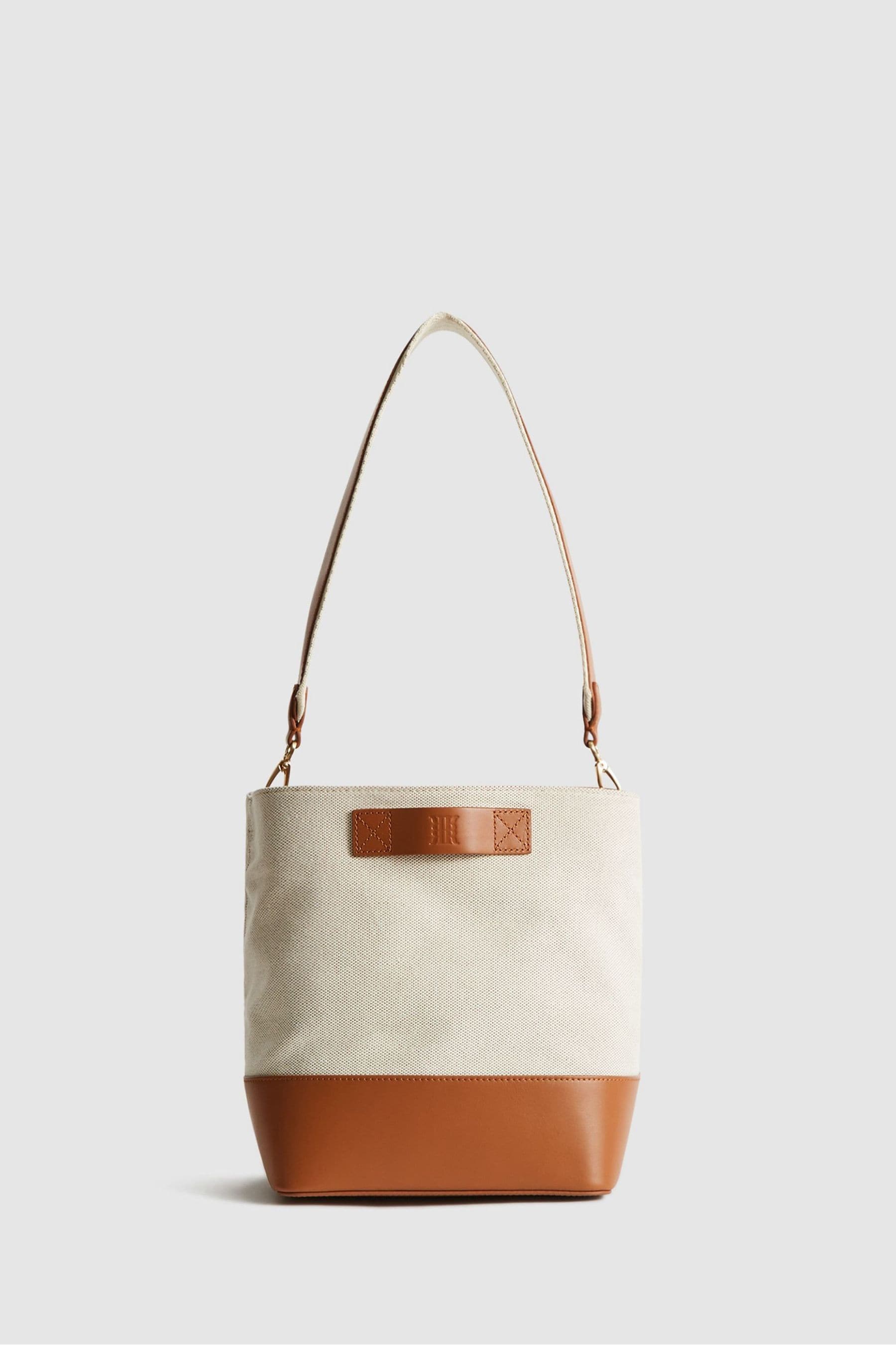 Small white top bucket bag