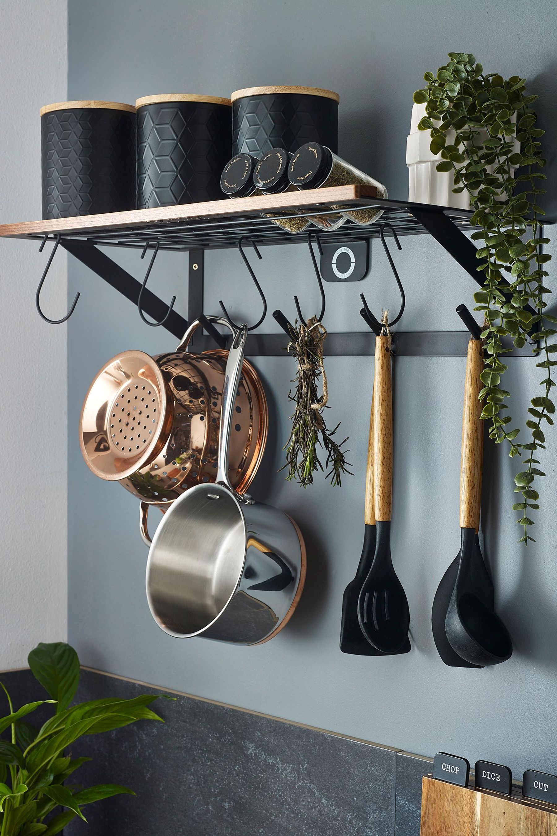 Wall hanging outlet rack for kitchen