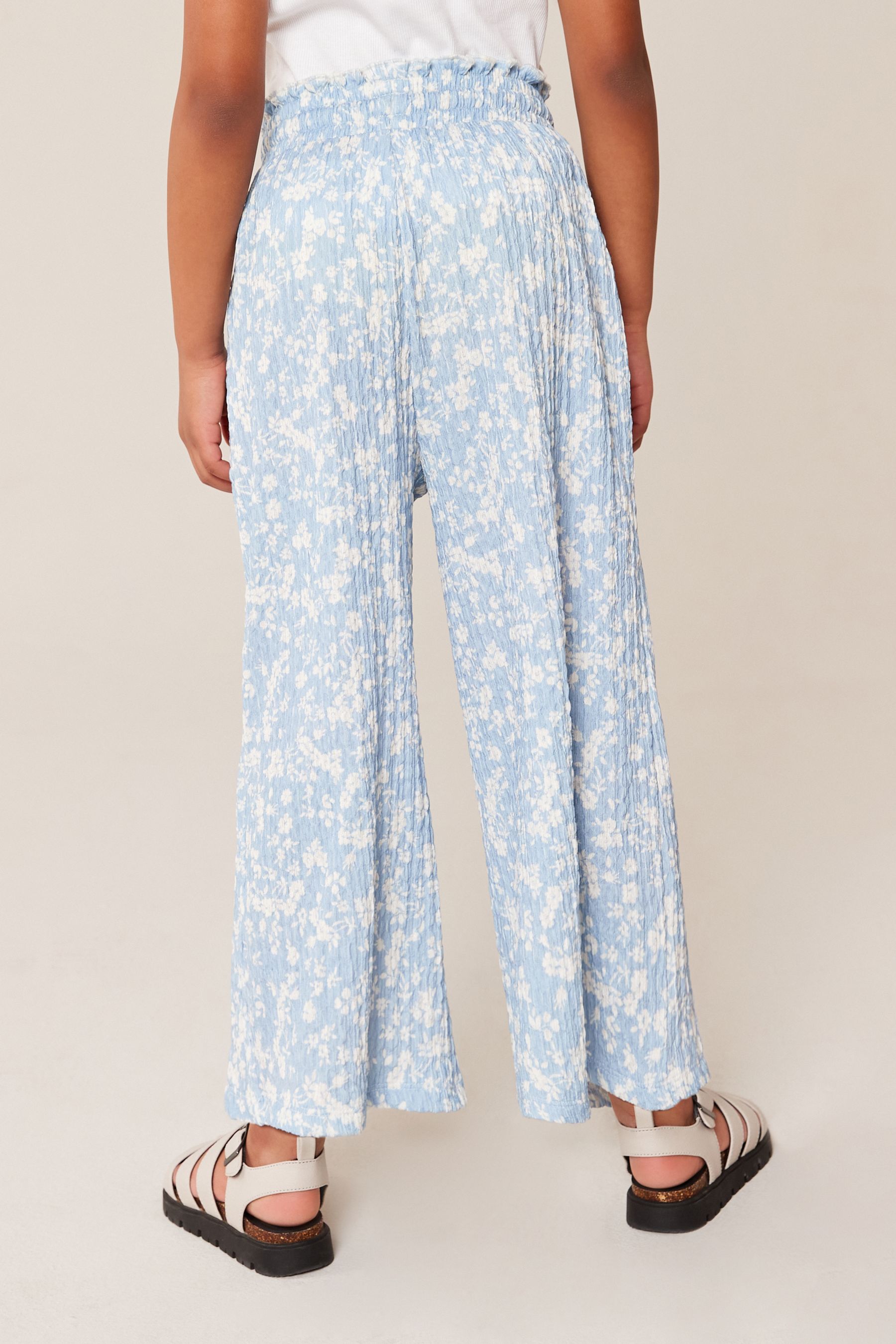 Buy Blue/ White Floral Print Crinkle Texture Jersey Wide Leg Trousers ...