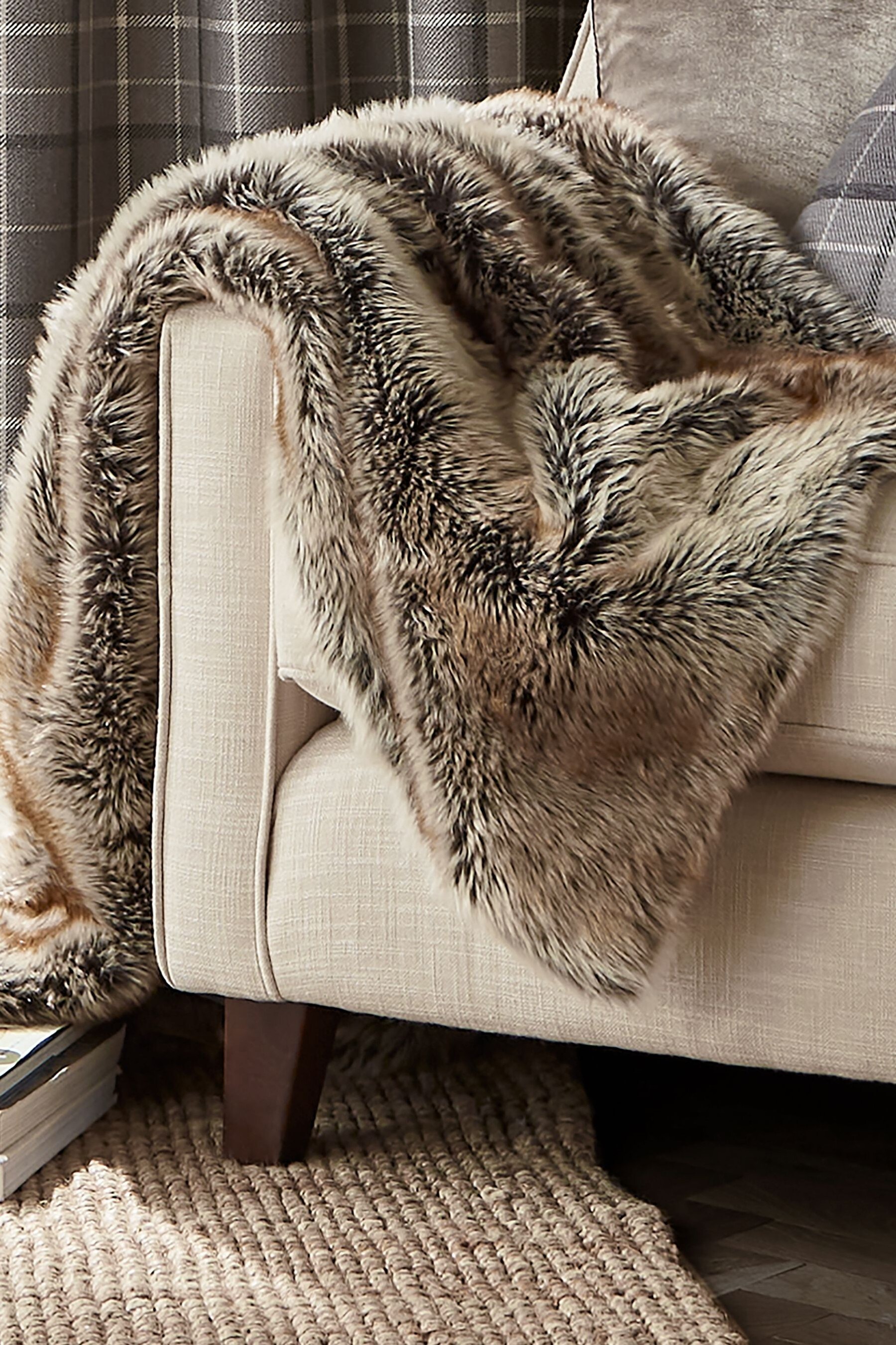Buy Laura Ashley Chocolate Hexham Faux Fur Throw from the ...