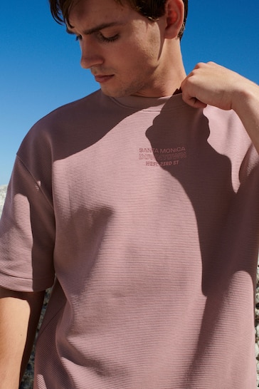 Buy Pink Relaxed Fit Graphic Heavyweight T-Shirt from the Next UK online shop