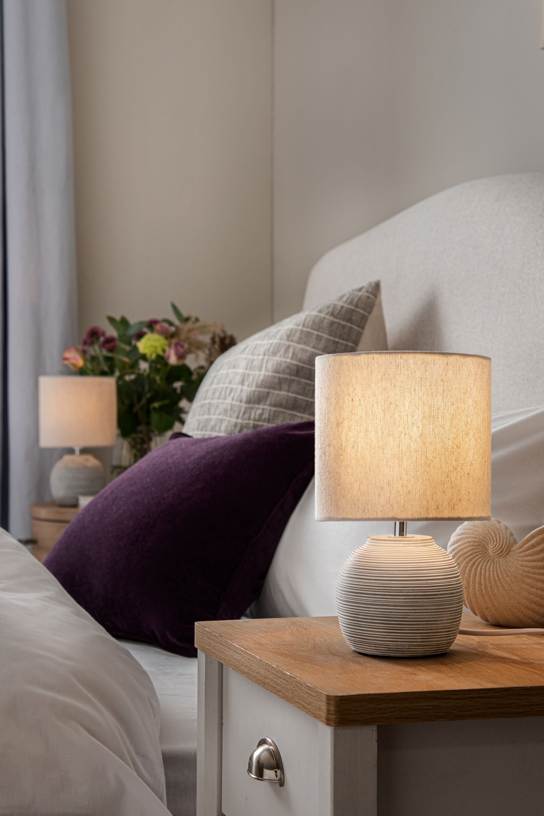 Lamp next shop to bed