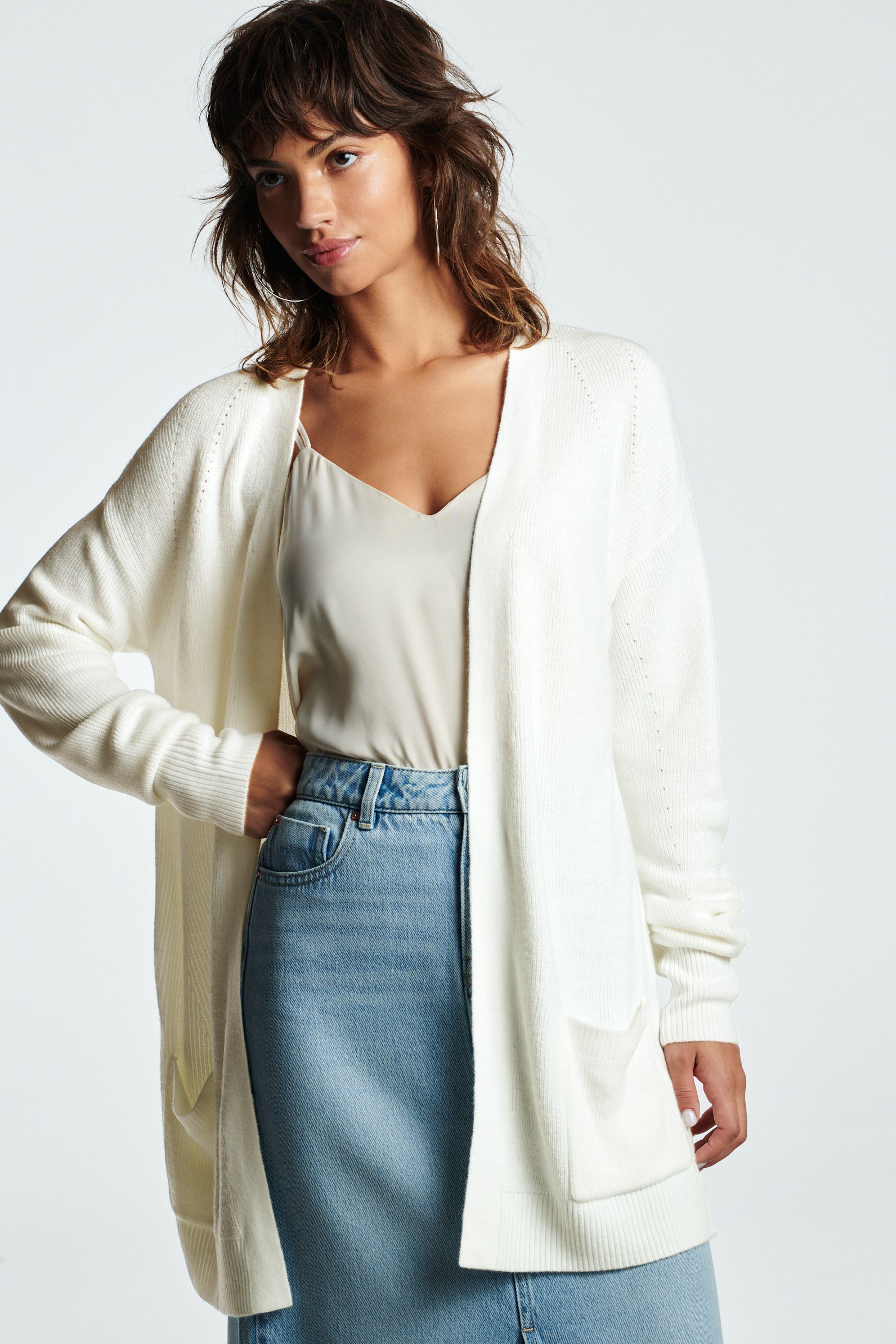 White cardigan with discount pockets