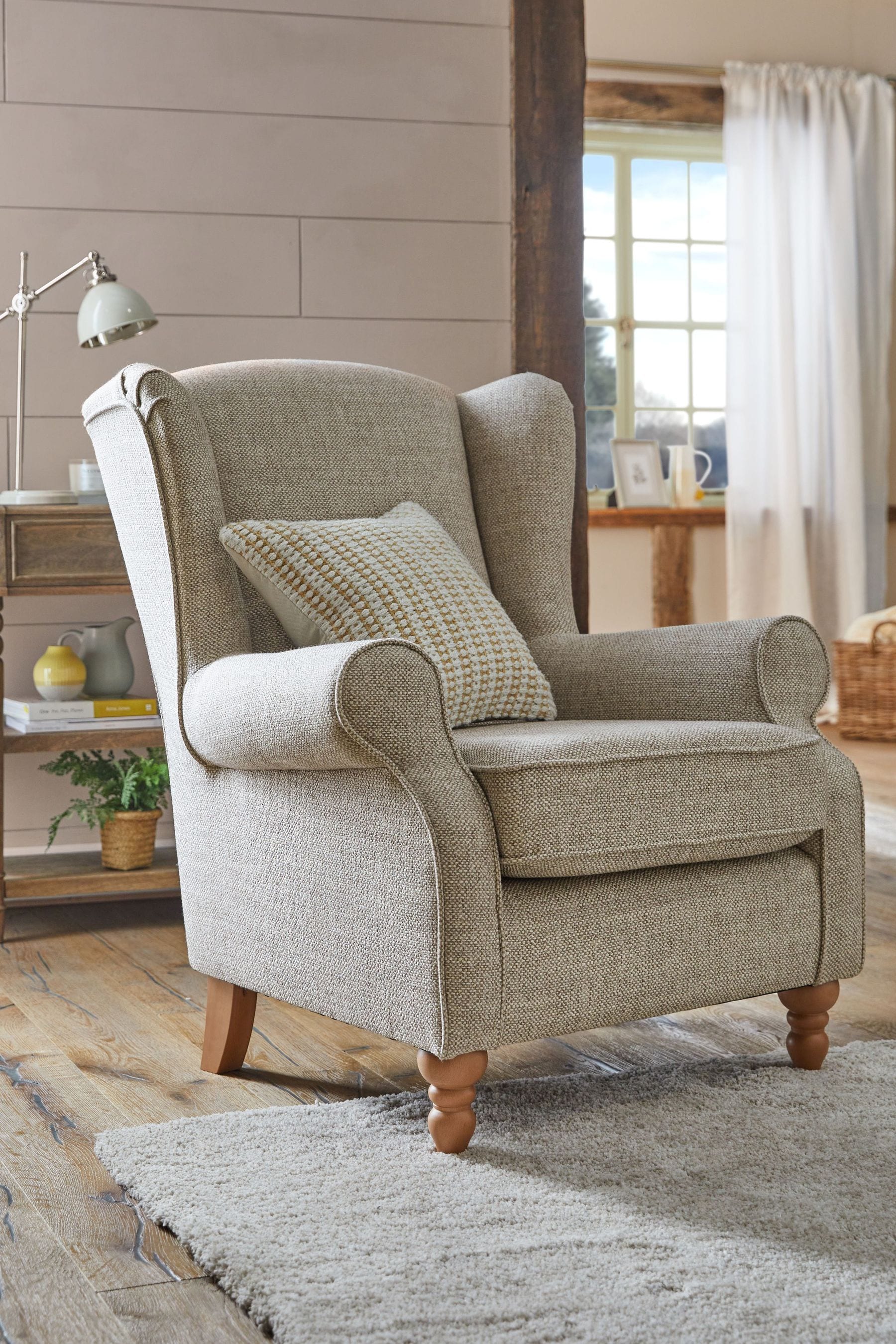 Slim high back outlet armchair