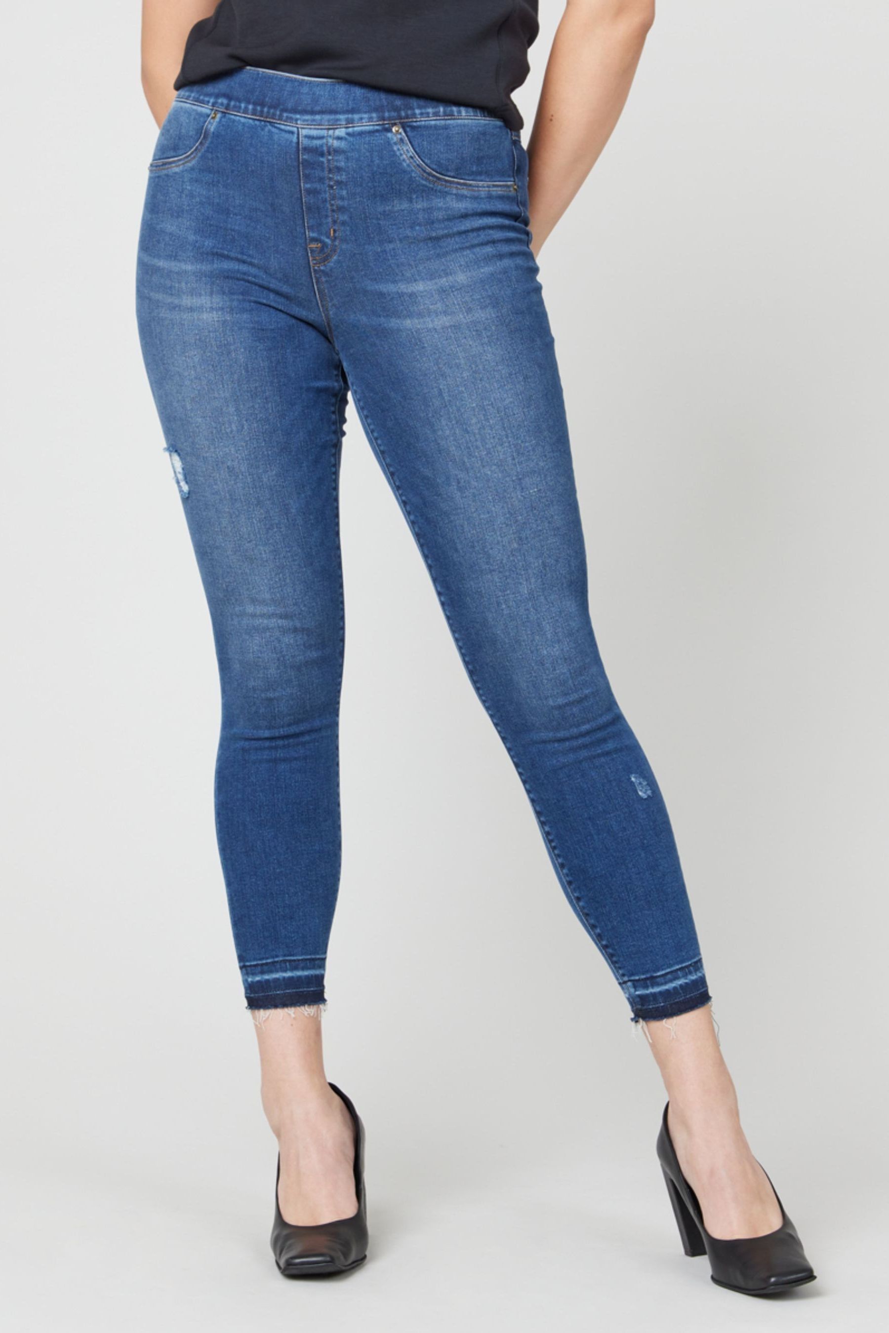 Distressed denim skinny jeans sales