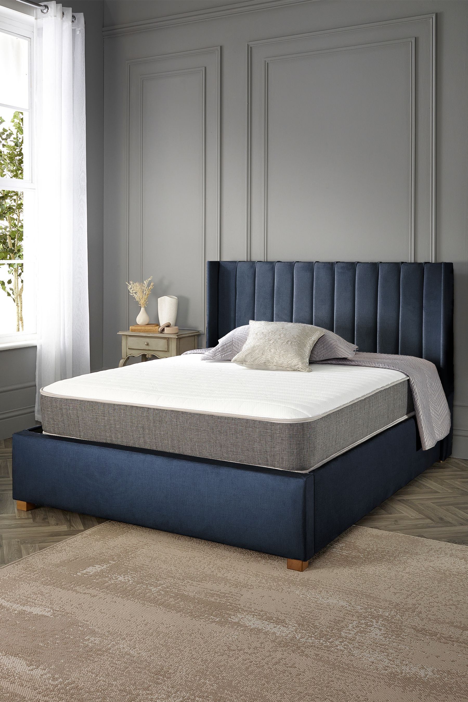 Navy upholstered sales ottoman