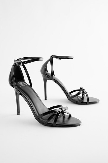 Buy Black Forever Comfort® Barely There Bow Stiletto Sandals from the ...