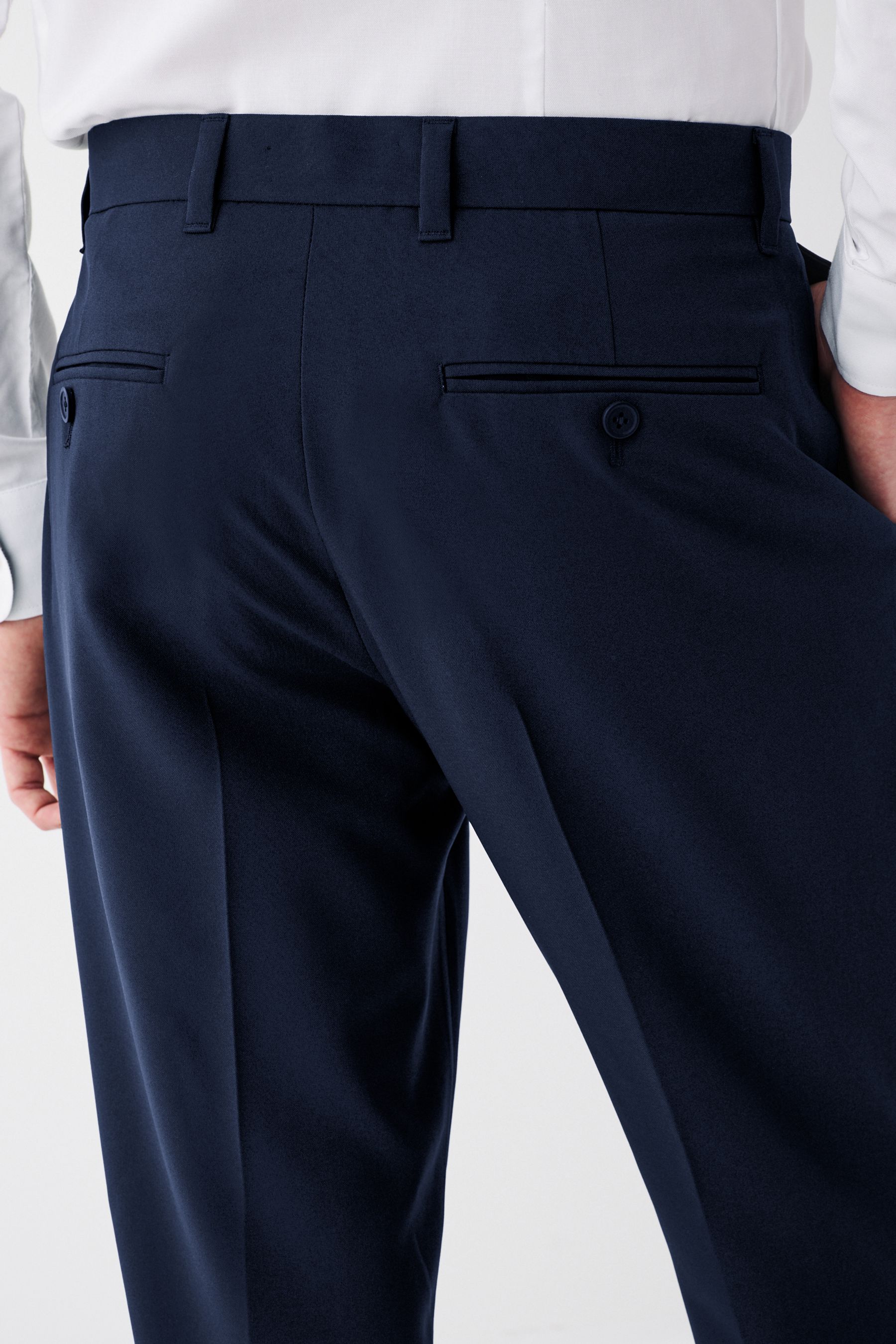 Buy Navy Blue Machine Washable Plain Front Smart Trousers from Next ...