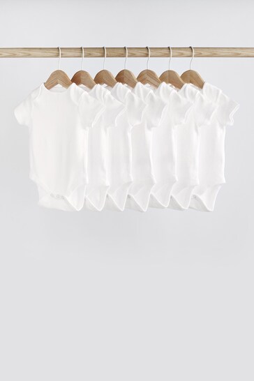 Buy White 7 Pack Essential Baby Short Sleeve Bodysuits from the Next UK online shop
