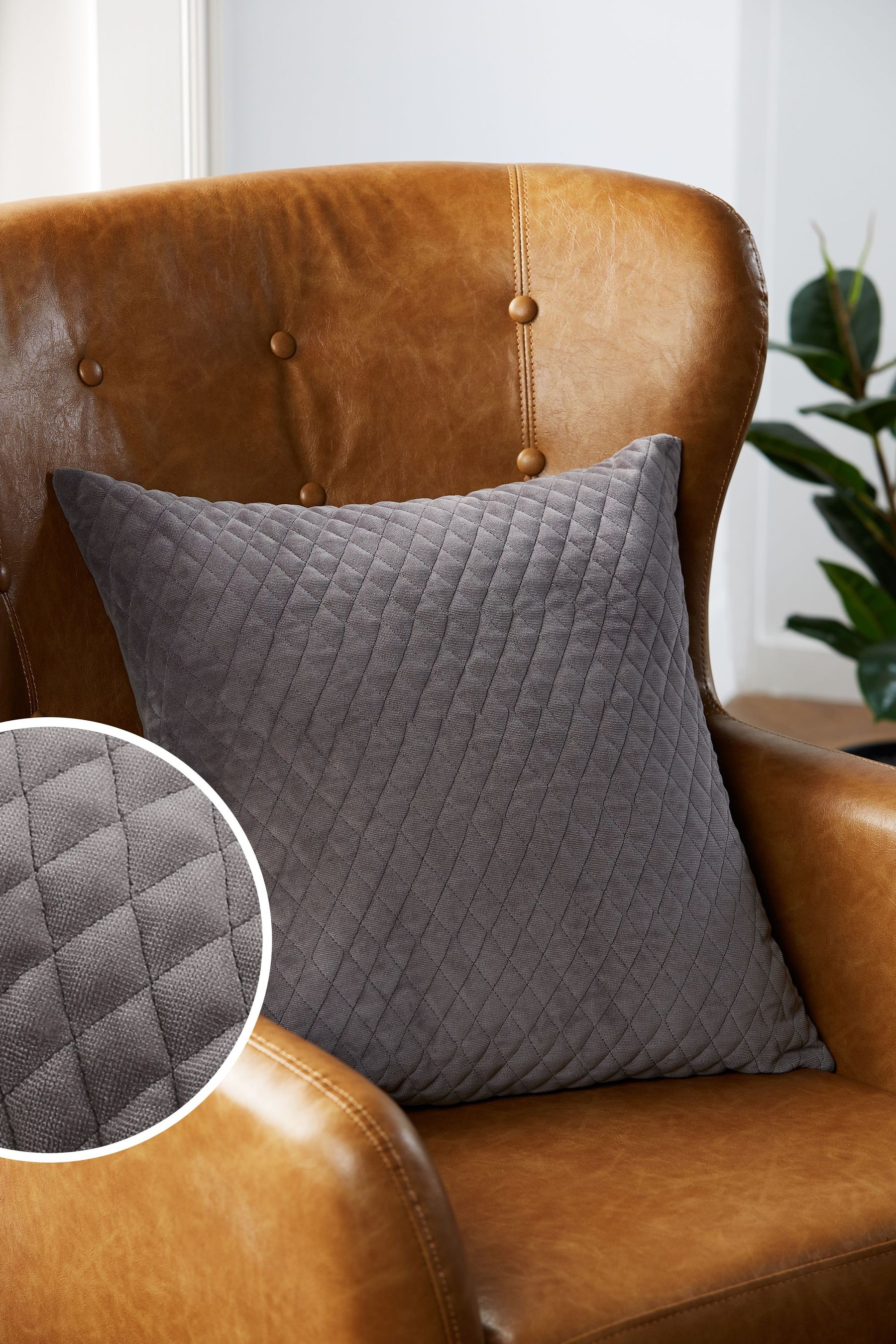Grey quilted cushion top