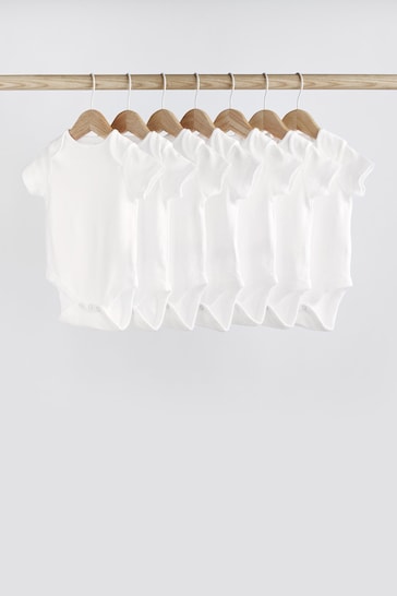 Buy White Essential 7 Pack Baby Short Sleeve Bodysuits from the Next UK online shop