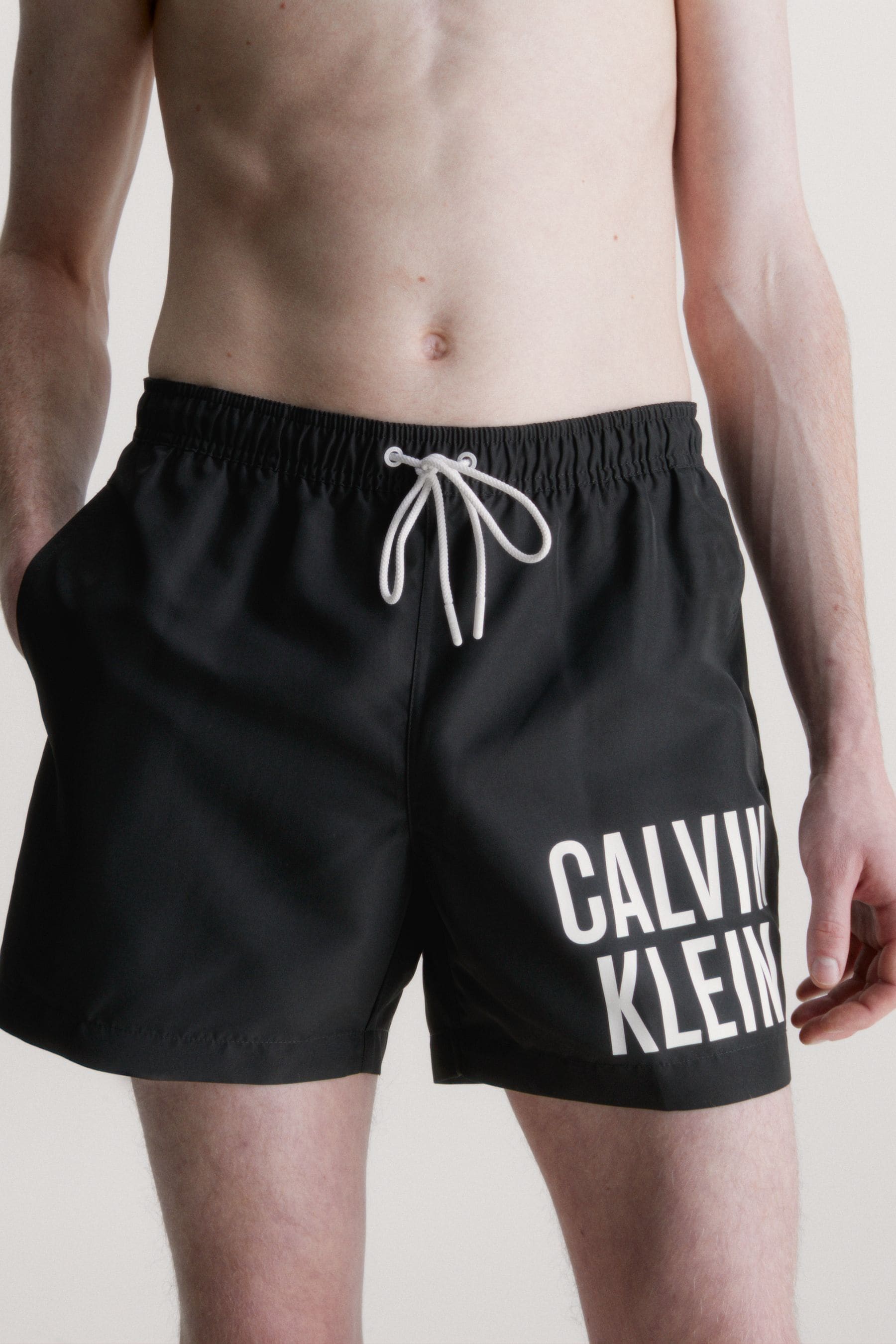 Black calvin hot sale klein swim shorts
