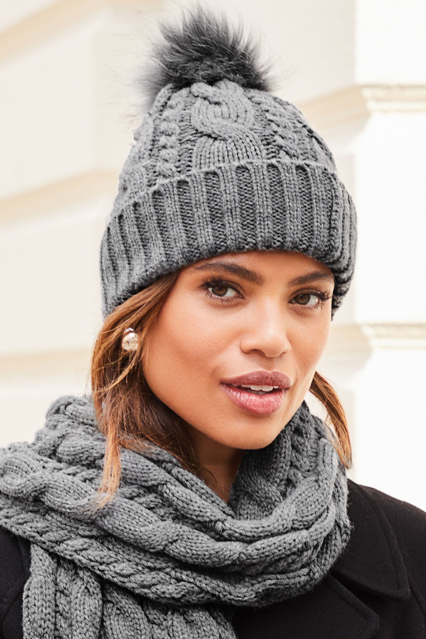 Cream fur bobble hotsell hat