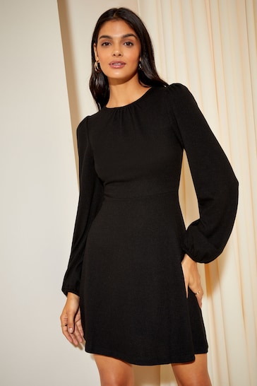 Friends Like These Black Knit Soft Touch Ruched Long Sleeve Mini Dress